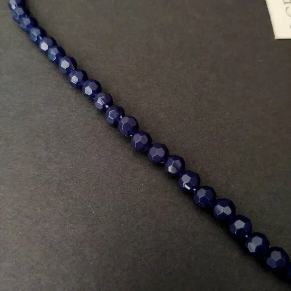 Navy beaded necklace with florescent orange thread tassel - Picture 7 of 12